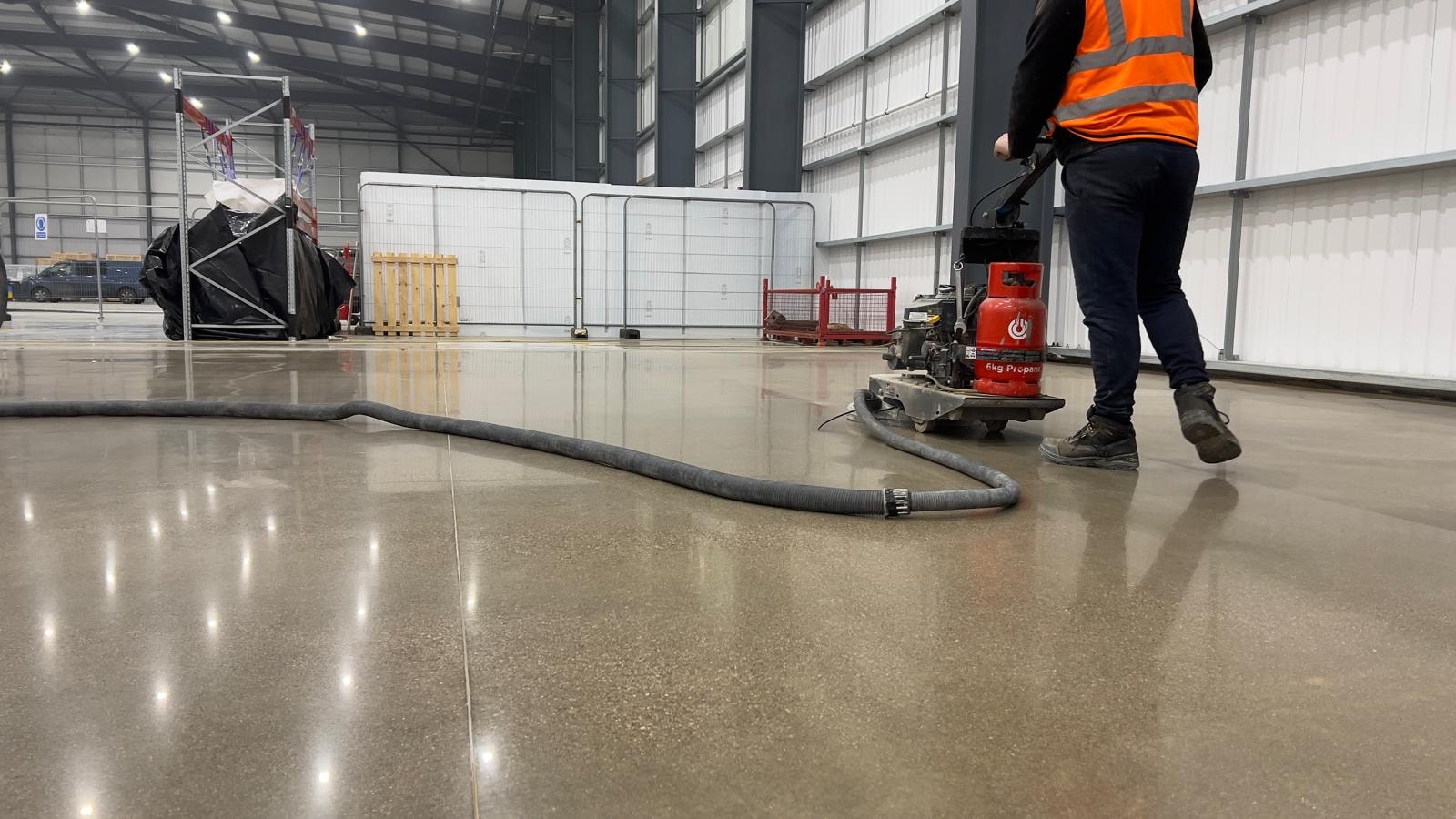 Concrete polishing in an industrial facility