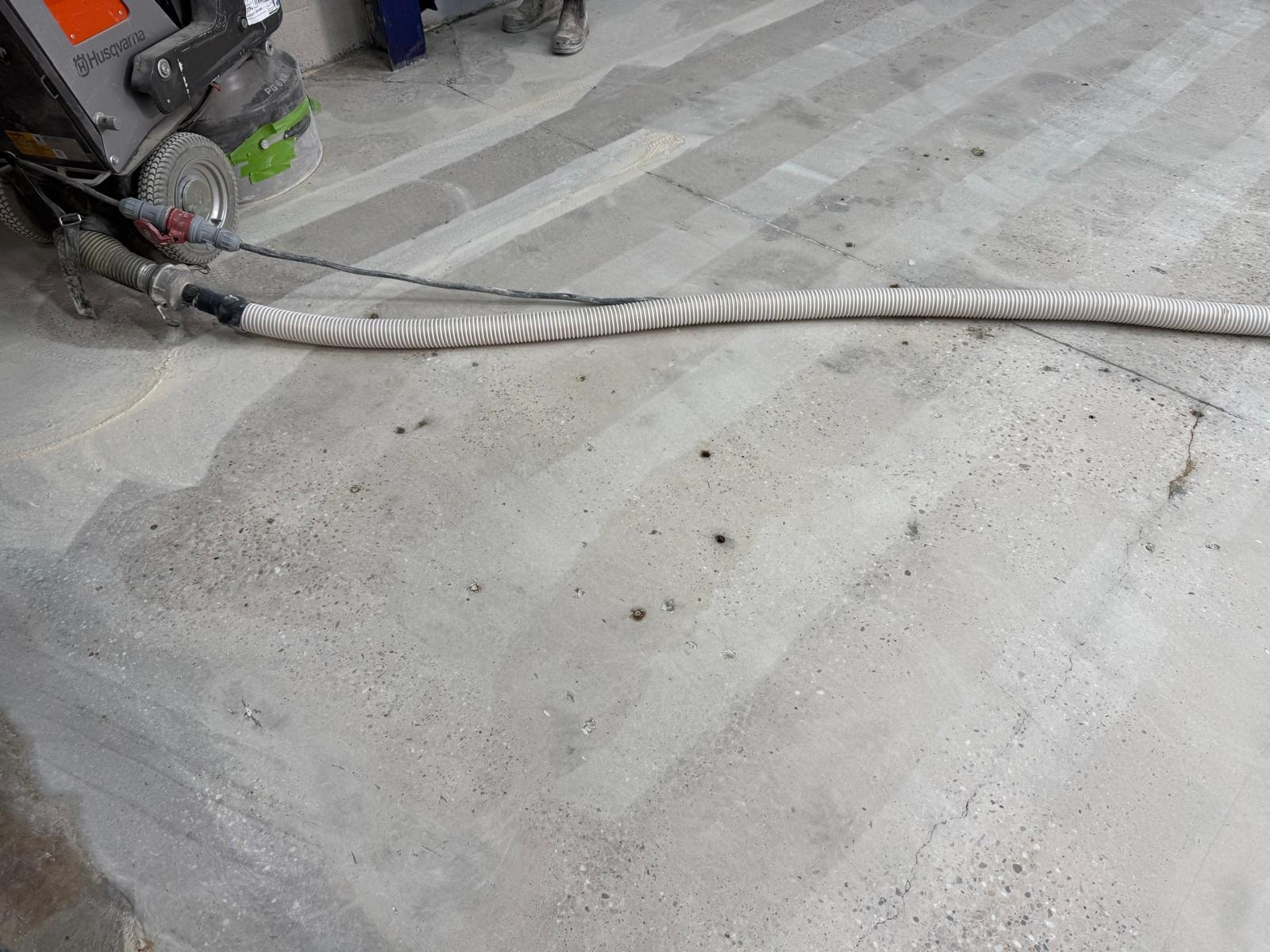 Surface grinding in an industrial facility